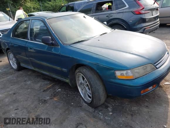 1994 Honda Accord LX z VIN 1HGCD5631RA068896, wystawiony jako IAAI lot #42552798 z przebiegiem 283 022 mil mil oraz . Historia ofert i sprzedaży dostępna na DreamBid. Obrazek 1.