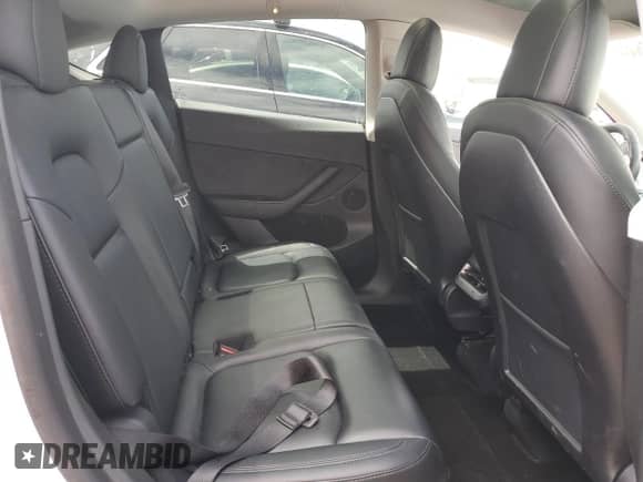 2023 Tesla Model Y Long Range with VIN 7SAYGAEE5PF592387, listed as a Copart auction lot 67555634 with 30,078 mi miles and Salvage title. Bid and sale history available at DreamBid. Image 11.