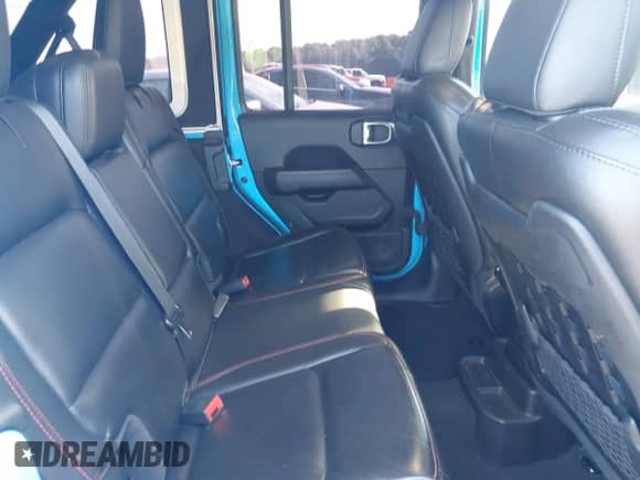 2021 Jeep Wrangler Unlimited Rubicon with VIN 1C4HJXFG8MW617520, listed as a IAAI auction lot 42606473 with 53,299 mi miles and . Bid and sale history available at DreamBid. Image 8.