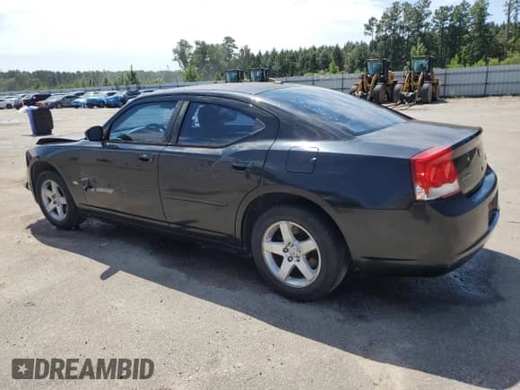 2010 Dodge Charger SXT with VIN 2B3CA3CV1AH248047, listed as a Copart auction lot 72056565 with 217,116 mi miles and Salvage title. Bid and sale history available at DreamBid. Image 2.
