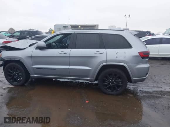 2021 Jeep Grand Cherokee Laredo E with VIN 1C4RJEAG6MC713910, listed as a IAAI auction lot 41041400 with 69,242 mi miles and . Bid and sale history available at DreamBid. Image 14.