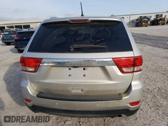 2011 Jeep Grand Cherokee 70th Anniversary with VIN 1J4RR4GG9BC645779, listed as a Copart auction lot 51339865 with 166,815 mi miles and Clean title. Bid and sale history available at DreamBid. Image 6.