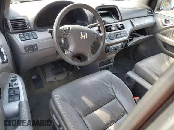 2009 Honda Odyssey Touring with VIN 5FNRL38979B059001, listed as a Copart auction lot 87042855 with 354,236 mi miles and Salvage title. Bid and sale history available at DreamBid. Image 8.