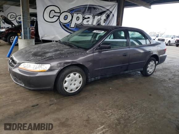1998 Honda Accord LX z VIN 1HGCG5646WA094793, wystawiony jako Copart lot #71434685 z przebiegiem 187 334 mil mil oraz Szkoda całkowita • Salvage title. Historia ofert i sprzedaży dostępna na DreamBid. Obrazek 1.