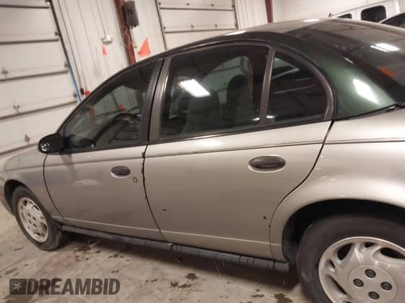 1997 Saturn SL with VIN 1G8ZH5280VZ172929, listed as a IAAI auction lot 41273214 with 134,972 mi miles and . Bid and sale history available at DreamBid. Image 15.