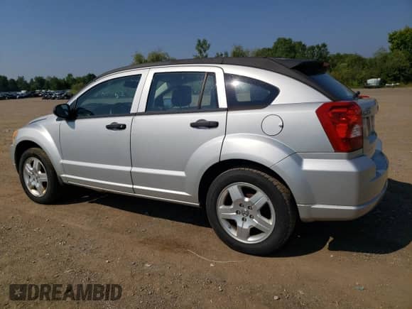 2011 Dodge Caliber z VIN 1B3CB1HA3BD296851, wystawiony jako Copart lot #68704655 z przebiegiem 113 601 mil mil oraz Czysty tytuł • Clean title. Historia ofert i sprzedaży dostępna na DreamBid. Obrazek 2.