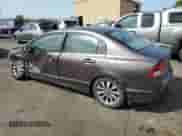 2010 Honda Civic with VIN 19FXA1F8XAE019092, listed as a Copart auction lot 71496354 with 185,077 mi miles and Salvage title. Bid and sale history available at DreamBid. Image 2.