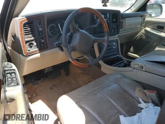 2002 Cadillac Escalade z VIN 1GYEC63T92R172834, wystawiony jako Copart lot #53606245 z przebiegiem 310 791 mil mil oraz Szkoda całkowita • Salvage title. Historia ofert i sprzedaży dostępna na DreamBid. Obrazek 8.