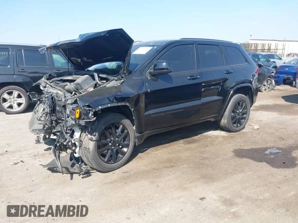 2021 Jeep Grand Cherokee Laredo X with VIN 1C4RJFAG8MC889752, listed as a IAAI auction lot 43241085 with 27,689 mi miles and . Bid and sale history available at DreamBid. Image 17.
