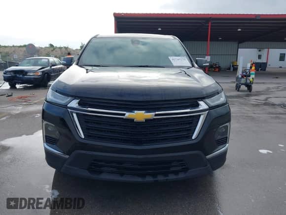 2023 Chevrolet Traverse LS z VIN 1GNERFKW1PJ333545, wystawiony jako IAAI lot #42745275 z przebiegiem 25 835 mil mil oraz . Historia ofert i sprzedaży dostępna na DreamBid. Obrazek 12.