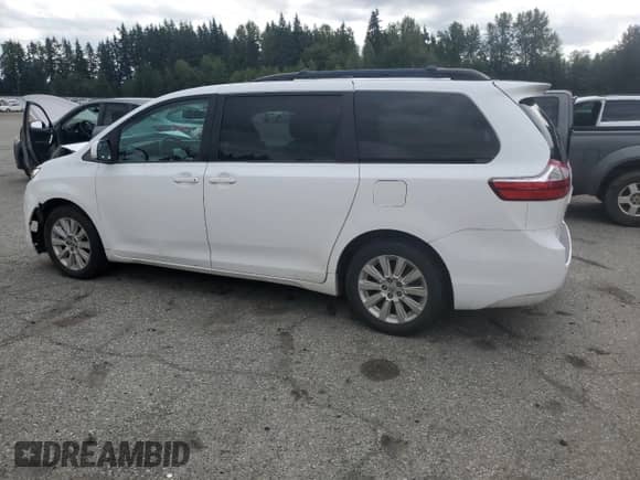 2015 Toyota Sienna LE z VIN 5TDJK3DC4FS108731, wystawiony jako Copart lot #68722175 z przebiegiem Nie podano mil oraz Szkoda całkowita • Salvage title. Historia ofert i sprzedaży dostępna na DreamBid. Obrazek 2.