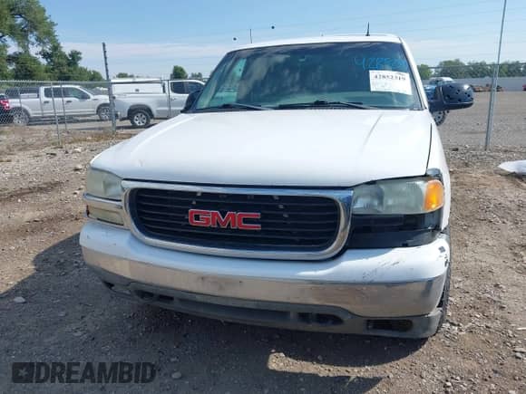 2002 GMC Sierra 1500 SLE z VIN 1GTEK19T22Z129469, wystawiony jako IAAI lot #42852319 z przebiegiem 283 614 mil mil oraz . Historia ofert i sprzedaży dostępna na DreamBid. Obrazek 6.