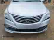 2017 Hyundai Azera Limited with VIN KMHFH4JG0HA581720, listed as a IAAI auction lot 42456573 with 137,317 mi miles and . Bid and sale history available at DreamBid. Image 12.