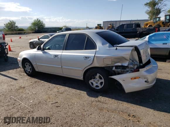 2003 Hyundai Accent GL z VIN KMHCG45C13U494378, wystawiony jako Copart lot #63713375 z przebiegiem 114 772 mil mil oraz Szkoda całkowita • Salvage title. Historia ofert i sprzedaży dostępna na DreamBid. Obrazek 2.