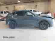 2022 Mazda CX-5 S Preferred z VIN JM3KFBCM6N0635417, wystawiony jako IAAI lot #43062973 z przebiegiem 63 803 mil mil oraz . Historia ofert i sprzedaży dostępna na DreamBid. Obrazek 13.