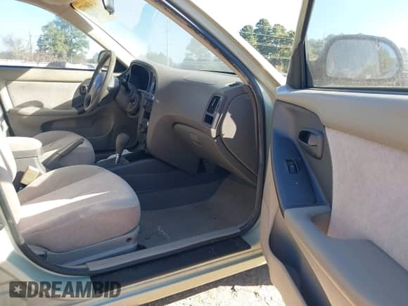 2004 Hyundai Elantra GLS with VIN KMHDN46D14U721703, listed as a IAAI auction lot 43436972 with 119,274 mi miles and . Bid and sale history available at DreamBid. Image 5.