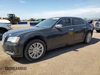 2014 Chrysler 300 C с VIN 2C3CCAKG2EH201085, выставлен на аукционе Copart как лот 65570235 с пробегом 131 879 миль миль и Списание • Salvage title. История ставок и продаж доступна на DreamBid. Изображение 1.
