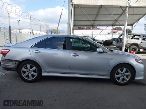 2009 Toyota Camry LE with VIN 4T1BE46K09U411877, listed as a IAAI auction lot 43441896 with 170,439 mi miles and . Bid and sale history available at DreamBid. Image 14.