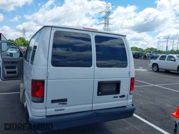 2013 Ford Econoline Cargo Commercial with VIN 1FTSS3EL8DDB11658, listed as a IAAI auction lot 42400365 with 170,019 mi miles and . Bid and sale history available at DreamBid. Image 16.