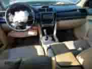 2014 Toyota Camry LE with VIN 4T1BD1FK8EU106252, listed as a Copart auction lot 68969405 with 256,940 mi miles and Salvage title. Bid and sale history available at DreamBid. Image 8.