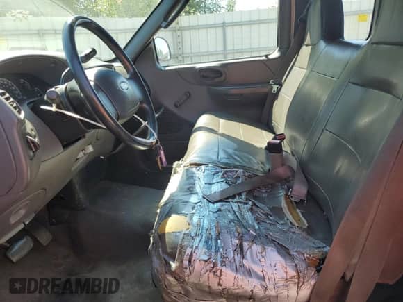 2004 Ford F-150 XL z VIN 2FTRX17294CA57005, wystawiony jako Copart lot #65088965 z przebiegiem Nie podano mil oraz Szkoda całkowita • Salvage title. Historia ofert i sprzedaży dostępna na DreamBid. Obrazek 7.