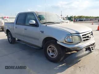 2003 Ford F-150 XLT with VIN 1FTRW07653KA38493, listed as a IAAI auction lot 43370849 with 213,498 mi miles and . Bid and sale history available at DreamBid. Image 1.