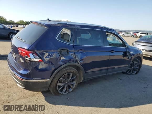 2023 Volkswagen Tiguan SE with VIN 3VVNB7AX2PM100310, listed as a Copart auction lot 80326395 with 8,474 mi miles and Salvage title. Bid and sale history available at DreamBid. Image 3.