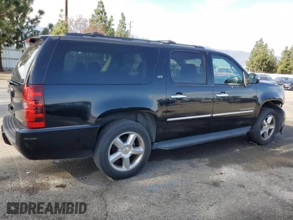2010 Chevrolet Suburban LTZ с VIN 1GNUCKE04AR231601, выставлен на аукционе Copart как лот 47387665 с пробегом 66 962 миль миль и Списание • Salvage title. История ставок и продаж доступна на DreamBid. Изображение 3.