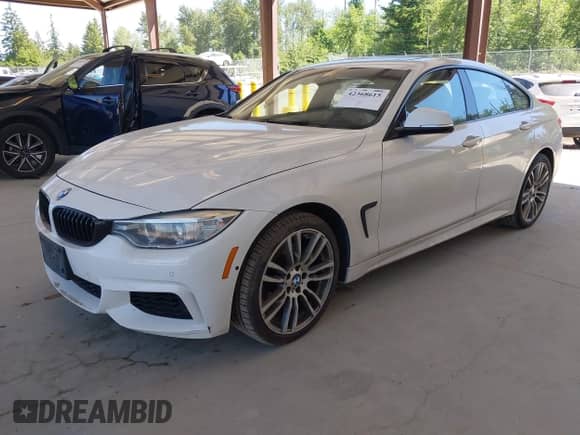 2015 BMW 4 Series 428i xDrive z VIN WBA4A7C55FD413965, wystawiony jako IAAI lot #42368615 z przebiegiem 108 308 mil mil oraz . Historia ofert i sprzedaży dostępna na DreamBid. Obrazek 17.