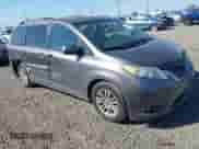 2016 Toyota Sienna XLE with VIN 5TDYK3DC8GS701587, listed as a IAAI auction lot 42444516 with 215,684 mi miles and . Bid and sale history available at DreamBid. Image 1.