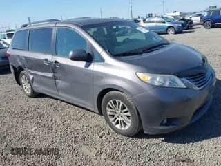2016 Toyota Sienna XLE with VIN 5TDYK3DC8GS701587, listed as a IAAI auction lot 42444516 with 215,684 mi miles and . Bid and sale history available at DreamBid. Image 1.
