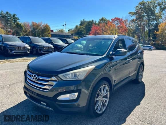 2013 Hyundai Santa Fe Sport z VIN 5XYZUDLB2DG042122, wystawiony jako Copart lot #89916455 z przebiegiem 245 302 mil mil oraz Czysty tytuł • Clean title. Historia ofert i sprzedaży dostępna na DreamBid. Obrazek 2.