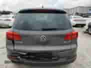 2013 Volkswagen Tiguan SE z VIN WVGAV3AX4DW581925, wystawiony jako Copart lot #55970105 z przebiegiem 115 504 mil mil oraz Czysty tytuł • Clean title. Historia ofert i sprzedaży dostępna na DreamBid. Obrazek 6.
