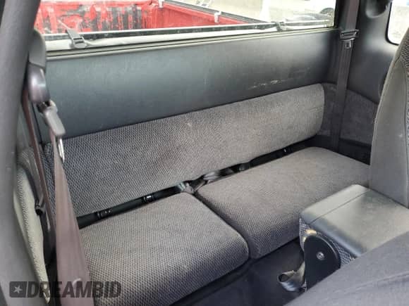 1999 Dodge Dakota SLT z VIN 1B7GG22Y3XS136064, wystawiony jako Copart lot #69782945 z przebiegiem 88 568 mil mil oraz Szkoda całkowita • Salvage title. Historia ofert i sprzedaży dostępna na DreamBid. Obrazek 10.