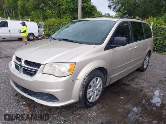 2014 Dodge Grand Caravan American Value with VIN 2C4RDGBG0ER130064, listed as a IAAI auction lot 43419562 with 161,517 mi miles and . Bid and sale history available at DreamBid. Image 2.