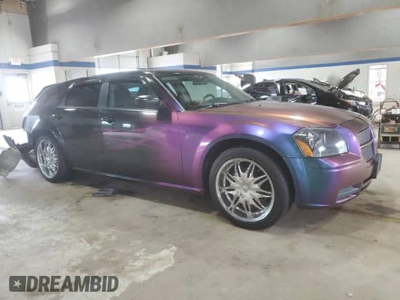 2005 Dodge Magnum SE with VIN 2D4FV48T25H161344, listed as a Copart auction lot 68303715 with 95,064 mi miles and Salvage title. Bid and sale history available at DreamBid. Image 4.