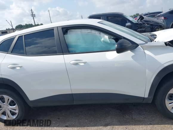 2024 Chevrolet Trax LS with VIN KL77LFE24RC208412, listed as a IAAI auction lot 42842056 with 26,959 mi miles and . Bid and sale history available at DreamBid. Image 14.