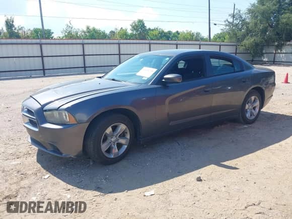2014 Dodge Charger SXT with VIN 2C3CDXHG0EH258716, listed as a IAAI auction lot 43128720 with 155,555 mi miles and . Bid and sale history available at DreamBid. Image 2.