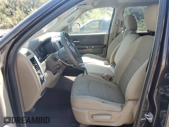 2011 Ram 1500 Big Horn с VIN 1D7RV1GT5BS666587, выставлен на аукционе Copart как лот 66126325 с пробегом 189 527 миль миль и Списание • Salvage title. История ставок и продаж доступна на DreamBid. Изображение 7.