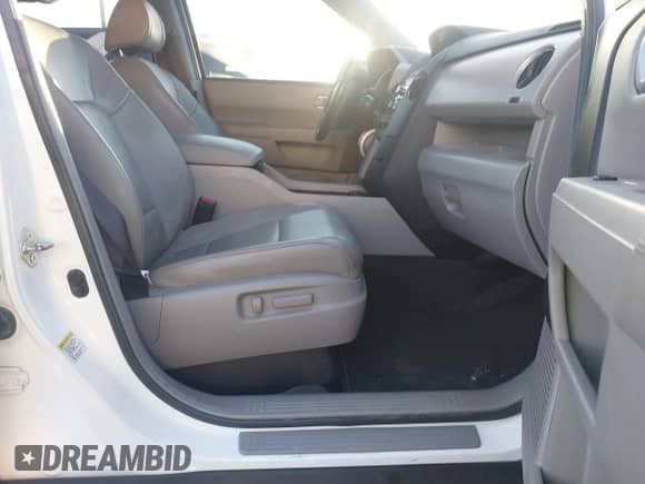 2013 Honda Pilot EX-L with VIN 5FNYF3H57DB004024, listed as a IAAI auction lot 43597652 with 144,099 mi miles and . Bid and sale history available at DreamBid. Image 5.