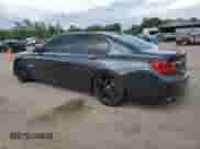 2014 BMW 7 Series 740Li with VIN WBAYE4C52ED137991, listed as a Copart auction lot 54702135 with 145,375 mi miles and Salvage title. Bid and sale history available at DreamBid. Image 2.