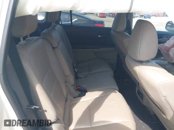 2019 Honda Pilot Touring 8-Passenger z VIN 5FNYF5H9XKB001842, wystawiony jako IAAI lot #43026784 z przebiegiem 114 674 mil mil oraz . Historia ofert i sprzedaży dostępna na DreamBid. Obrazek 8.