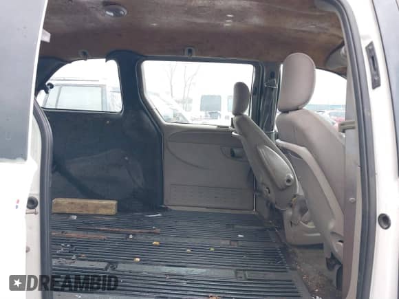 2003 Dodge Caravan Cargo with VIN 1D4GP21383B339065, listed as a IAAI auction lot 41069958 with 93,865 mi miles and . Bid and sale history available at DreamBid. Image 8.