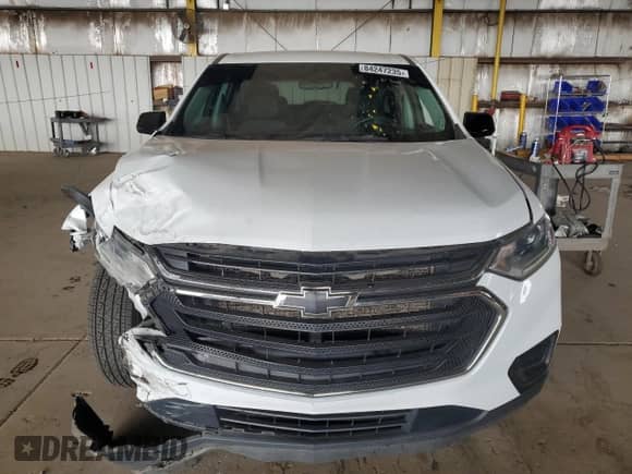 2020 Chevrolet Traverse LS z VIN 1GNERFKW4LJ275652, wystawiony jako Copart lot #84247235 z przebiegiem 113 236 mil mil oraz Szkoda całkowita • Salvage title. Historia ofert i sprzedaży dostępna na DreamBid. Obrazek 5.