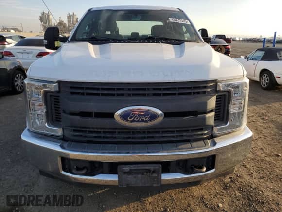 2018 Ford F-250 XL with VIN 1FT7W2A63JEC58643, listed as a Copart auction lot 43021305 with 113,829 mi miles and Salvage title. Bid and sale history available at DreamBid. Image 5.