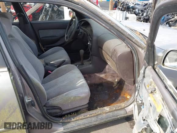 1994 Toyota Camry LE z VIN JT2SK12EXR0263202, wystawiony jako IAAI lot #43497547 z przebiegiem 183 736 mil mil oraz . Historia ofert i sprzedaży dostępna na DreamBid. Obrazek 5.