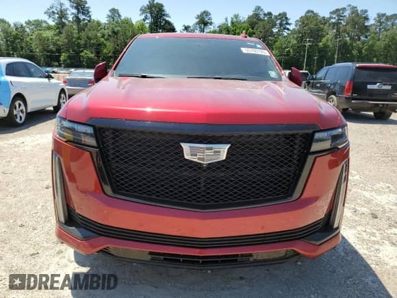 2023 Cadillac Escalade 4WD Sport with VIN 1GYS4FKL8PR325468, listed as a Copart auction lot 55700105 with 33,284 mi miles and Salvage title. Bid and sale history available at DreamBid. Image 5.