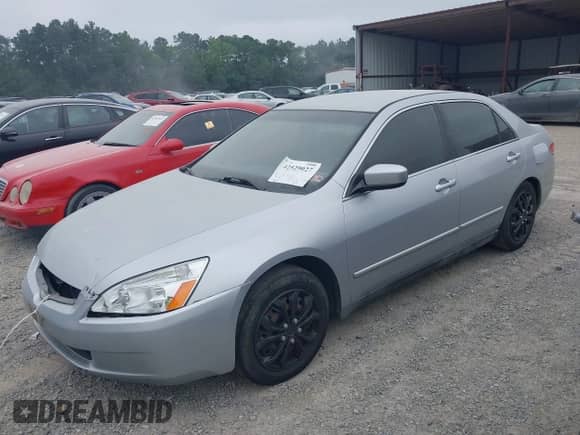 2003 Honda Accord LX with VIN 1HGCM66353A045621, listed as a IAAI auction lot 42529027 with 303,226 mi miles and . Bid and sale history available at DreamBid. Image 2.