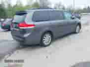 2012 Toyota Sienna XLE with VIN 5TDDK3DC2CS043855, listed as a IAAI auction lot 42189680 with 195,788 mi miles and . Bid and sale history available at DreamBid. Image 4.