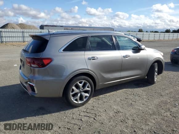 2019 Kia Sorento SX z VIN 5XYPK4A53KG453956, wystawiony jako Copart lot #71741505 z przebiegiem 100 634 mil mil oraz Szkoda całkowita • Salvage title. Historia ofert i sprzedaży dostępna na DreamBid. Obrazek 3.